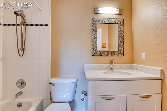 full bathroom with  shower combination, a wall mounted AC, vanity, and toilet