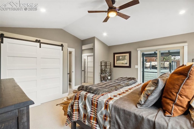 bedroom with a barn door, access to outside, lofted ceiling, carpet flooring, and a ceiling fan