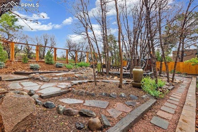 view of yard with fence