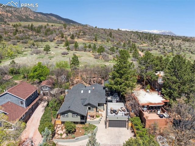 view from above of property featuring a mountainous background