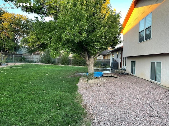 view of yard featuring a fenced backyard