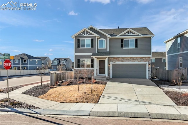 view of front of property featuring a garage, concrete driveway, a residential view, fence, and brick siding