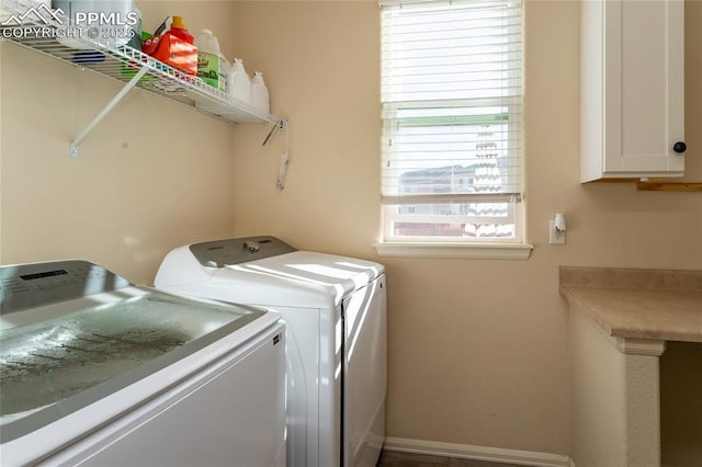 clothes washing area with laundry area and washer and clothes dryer