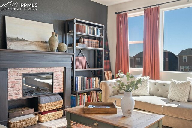 interior space with a glass covered fireplace