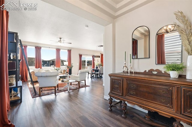 interior space featuring wood finished floors and a ceiling fan