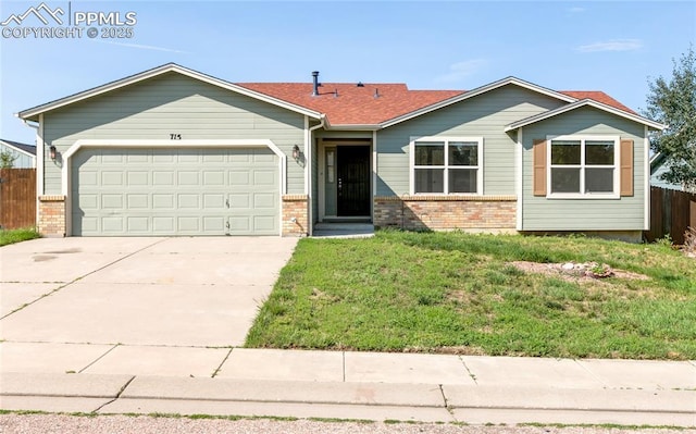 ranch-style house with a garage, brick siding, fence, concrete driveway, and a front yard