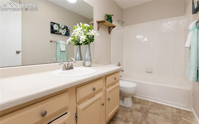 full bathroom featuring toilet, vanity, and shower / bathing tub combination