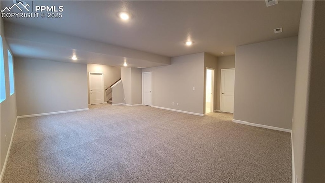 9455 Jollity Pt, Colorado Springs, CO 80924 - finished below grade area featuring baseboards, stairs, light colored carpet, and recessed lighting