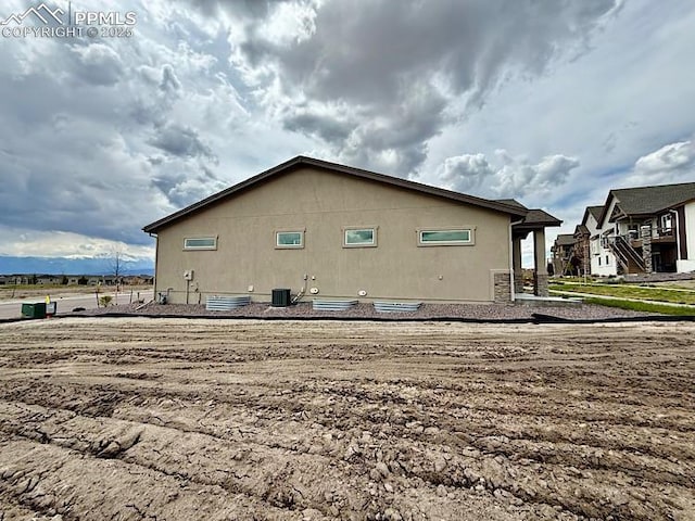 9455 Jollity Pt, Colorado Springs, CO 80924 - view of side of property featuring central AC