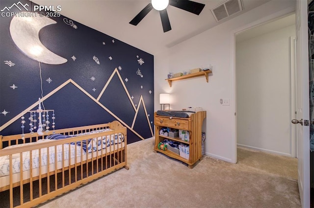 bedroom with a ceiling fan, baseboards, visible vents, and carpet flooring