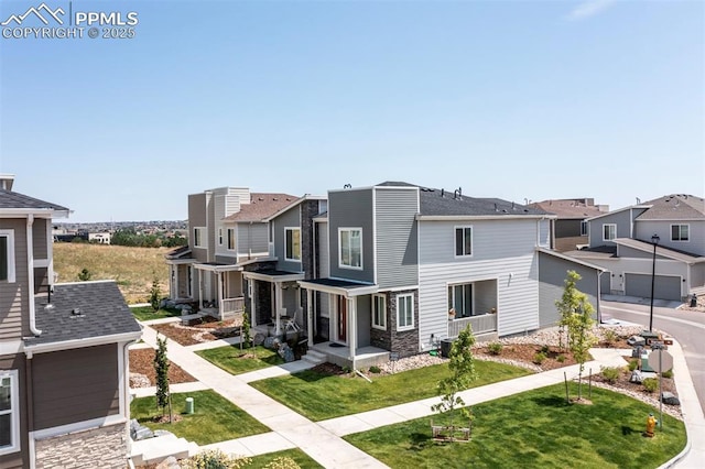 exterior space with a residential view and a front lawn