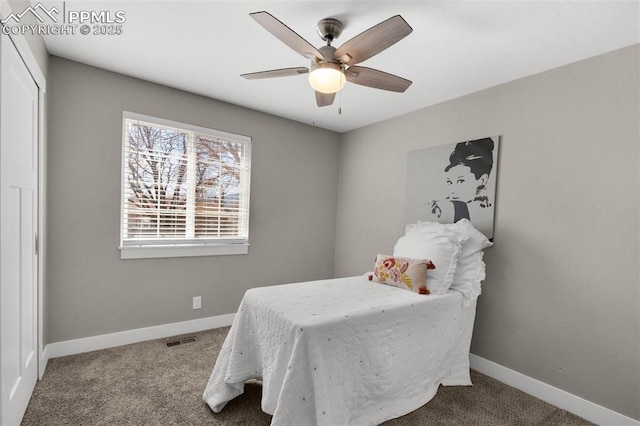 bedroom featuring baseboards, visible vents, and carpet flooring