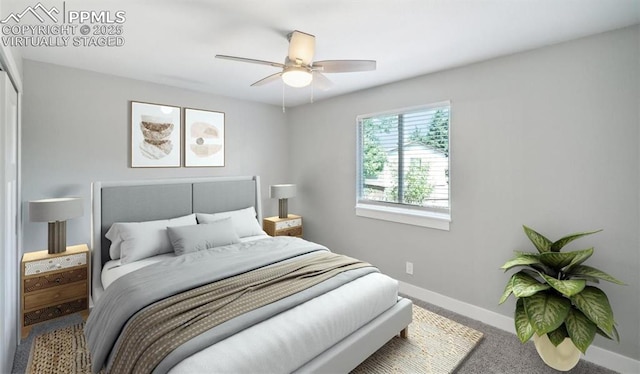 bedroom with carpet floors, ceiling fan, and baseboards