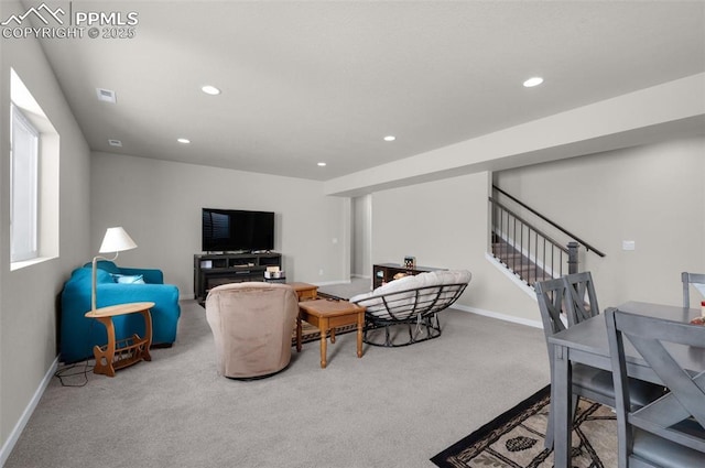 carpeted living area with visible vents, stairway, recessed lighting, and baseboards