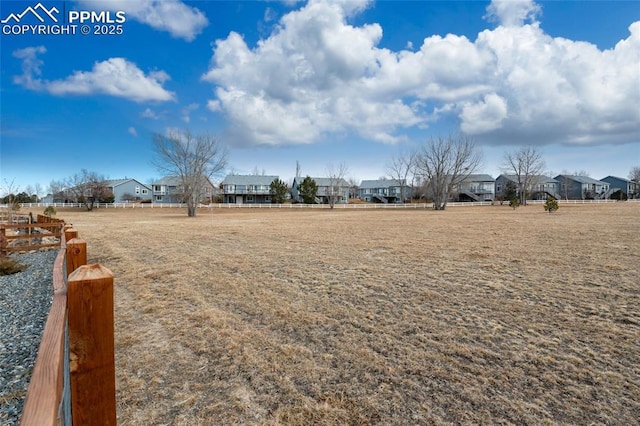 view of yard featuring a residential view