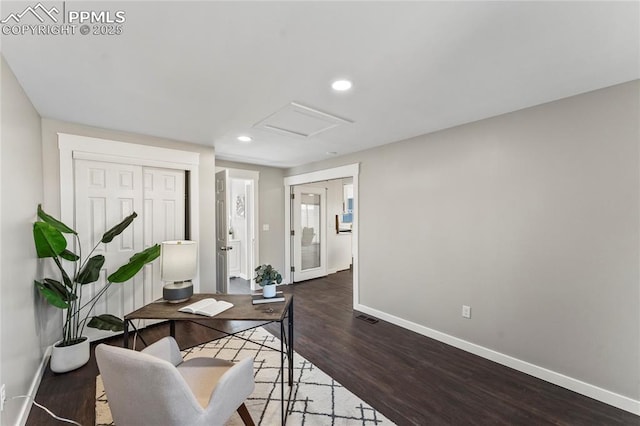 office featuring attic access, visible vents, baseboards, wood finished floors, and recessed lighting