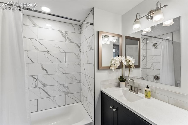 full bathroom with shower / bath combo with shower curtain and vanity