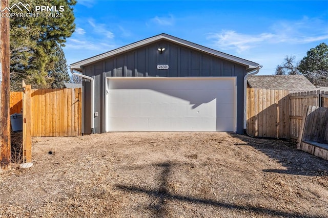 detached garage with fence