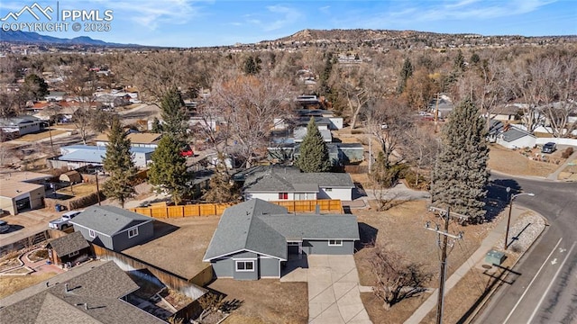 aerial view featuring a mountain view and a residential view