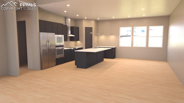 240 N Limit St, Colorado Springs, CO 80904 - kitchen with appliances with stainless steel finishes, light countertops, dark cabinetry, a center island with sink, and recessed lighting
