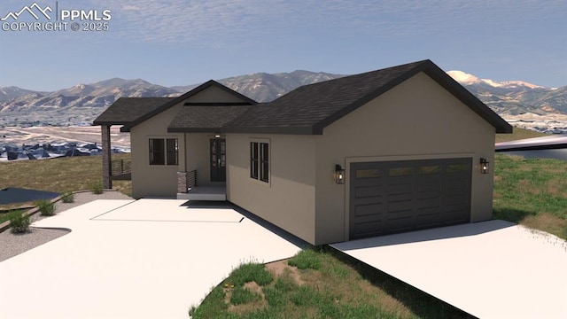 240 N Limit St, Colorado Springs, CO 80904 - view of front of property with stucco siding, a mountain view, concrete driveway, and an attached garage