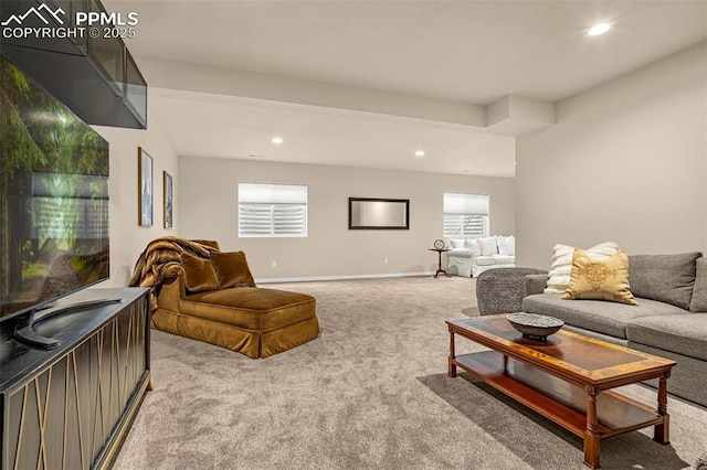 living room featuring recessed lighting, carpet flooring, and baseboards