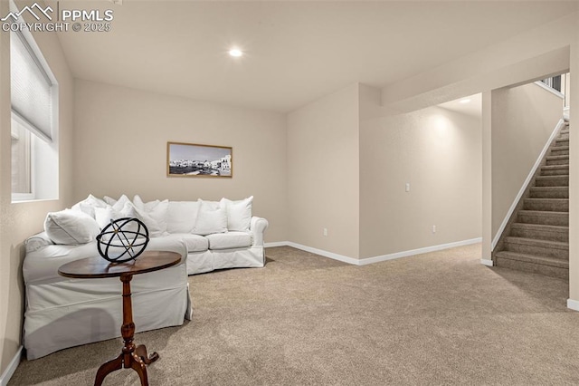 living area with carpet, recessed lighting, baseboards, and stairs