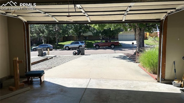 garage featuring fence