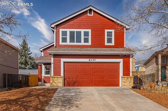 view of front of home featuring a garage, concrete driveway, brick siding, and fence