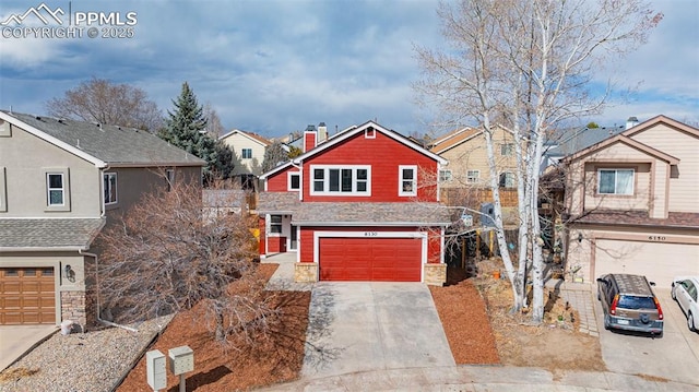 view of front of house with a garage, driveway, stone siding, a residential view, and a chimney