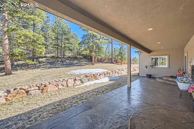 view of patio / terrace with fence