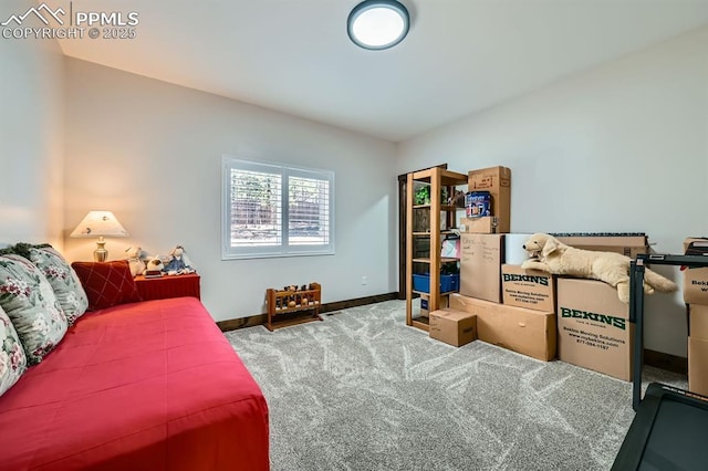 carpeted bedroom with baseboards