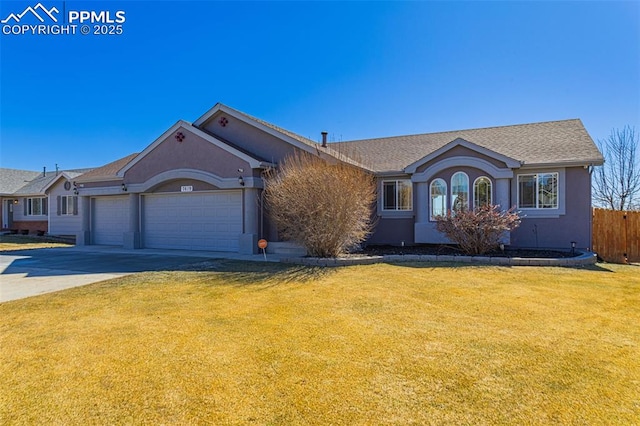 ranch-style home featuring a garage, fence, driveway, stucco siding, and a front yard