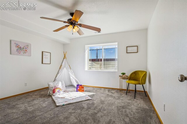 7619 High Gate Dr, Fountain, CO 80817 - rec room featuring carpet floors, baseboards, and a ceiling fan