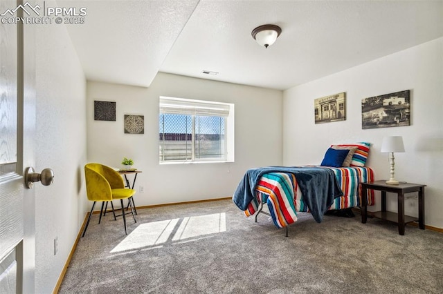7619 High Gate Dr, Fountain, CO 80817 - bedroom featuring carpet floors, visible vents, and baseboards