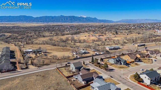 7619 High Gate Dr, Fountain, CO 80817 - birds eye view of property with a residential view and a mountain view