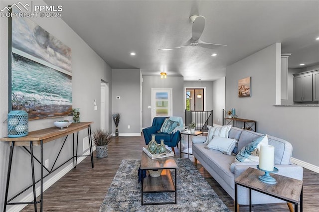 living area featuring ceiling fan, baseboards, wood finished floors, and recessed lighting