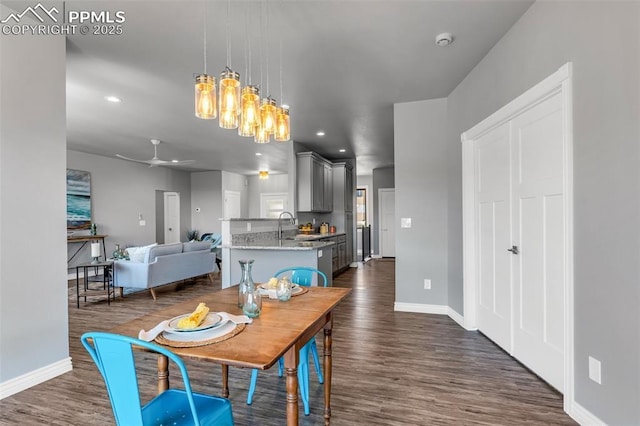 dining area featuring dark wood-style floors, recessed lighting, a ceiling fan, and baseboards