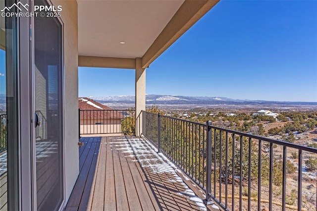 balcony featuring a mountain view