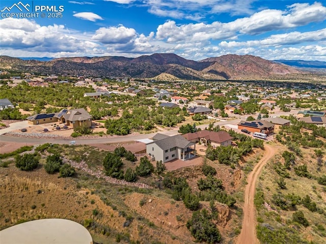 bird's eye view featuring a residential view and a mountain view