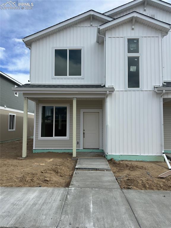 view of front of house featuring covered porch and board and batten siding