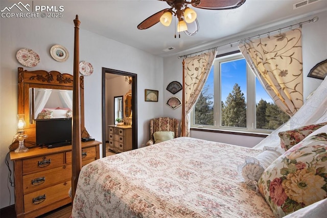 bedroom with a ceiling fan and visible vents