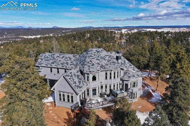 bird's eye view with a view of trees