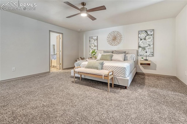 bedroom with light carpet, ceiling fan, baseboards, and ensuite bathroom