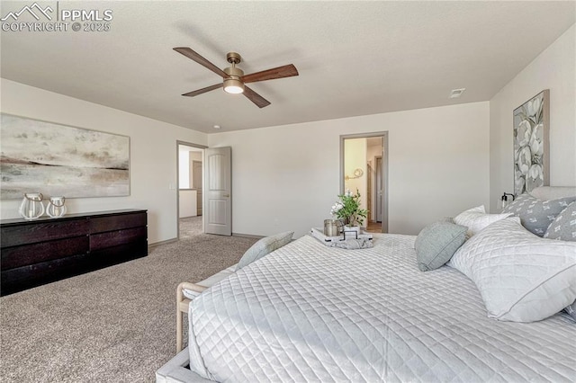 carpeted bedroom with baseboards and a ceiling fan