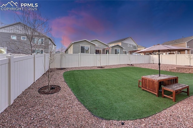 view of yard featuring a fenced backyard