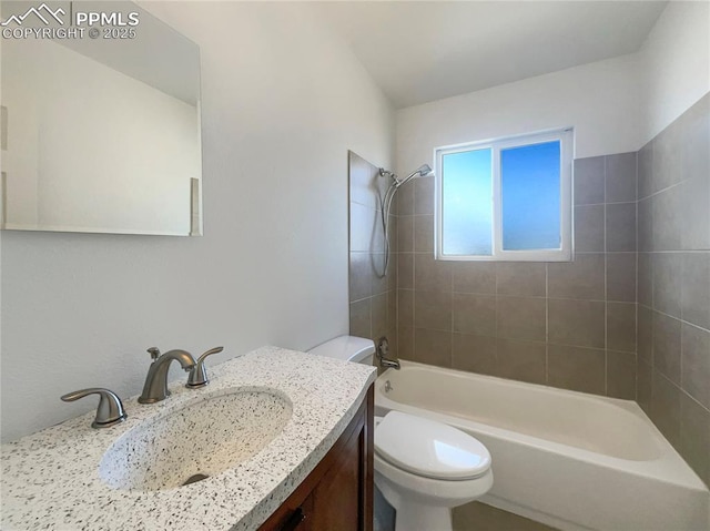 full bath with toilet,  shower combination, and vanity