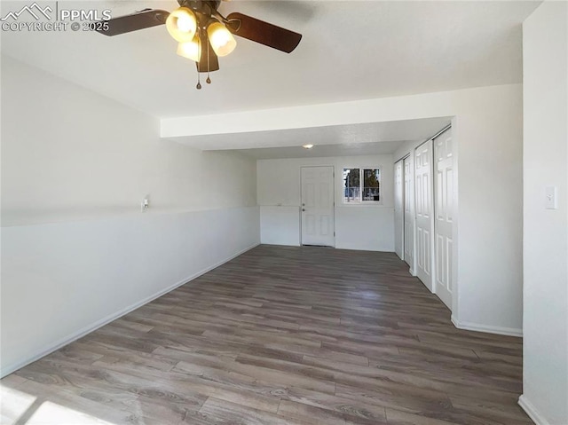 empty room featuring wood finished floors