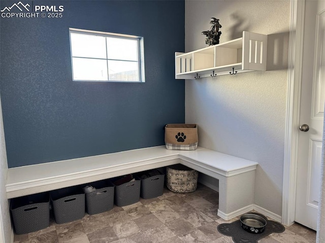 mudroom featuring baseboards