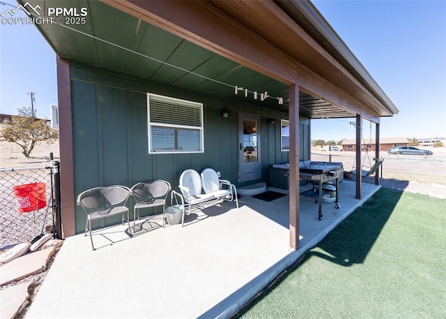 view of patio with fence